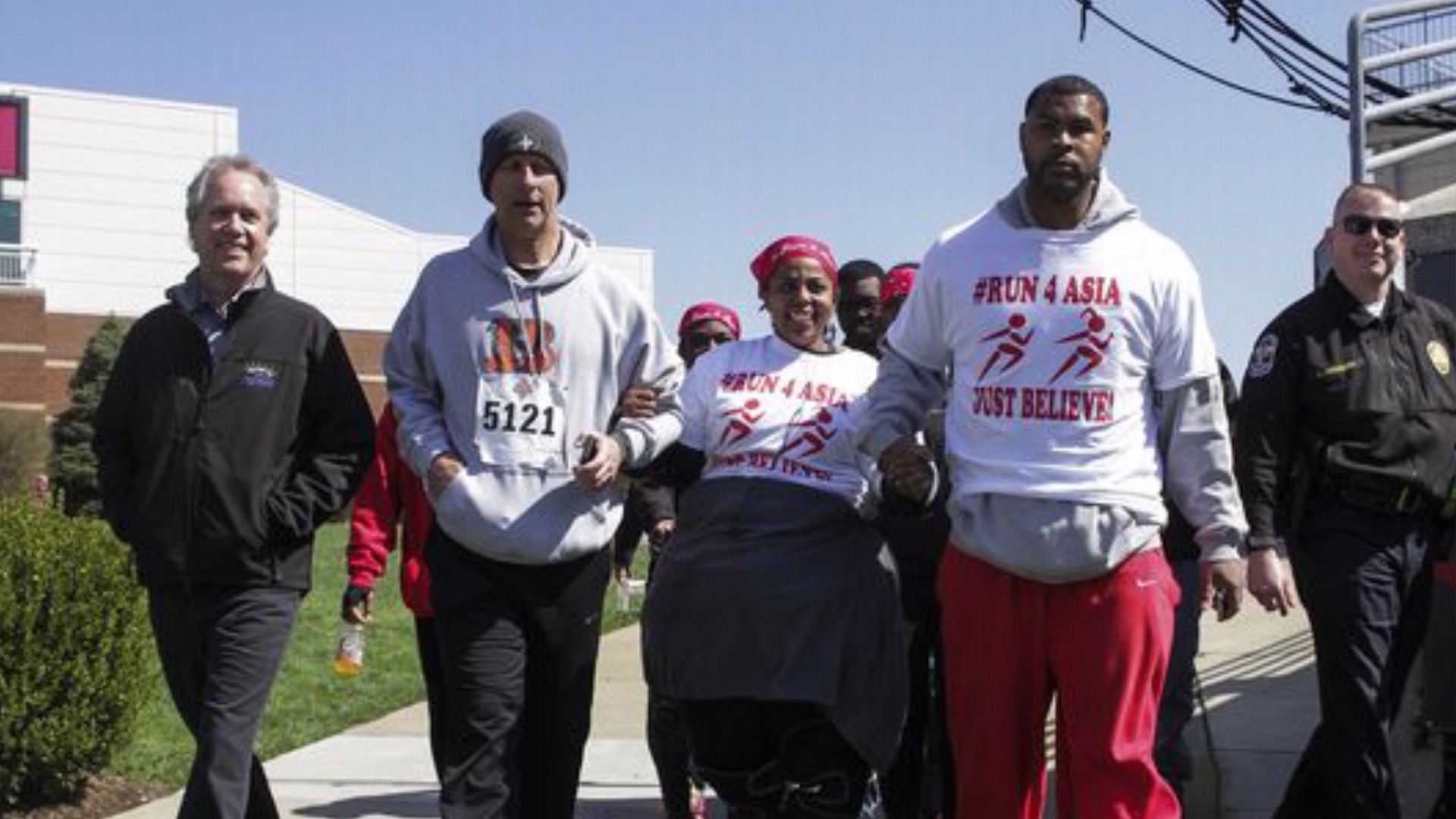 Asia Ford finishes Papa John's 10 miler, providing more inspiration for Lou.