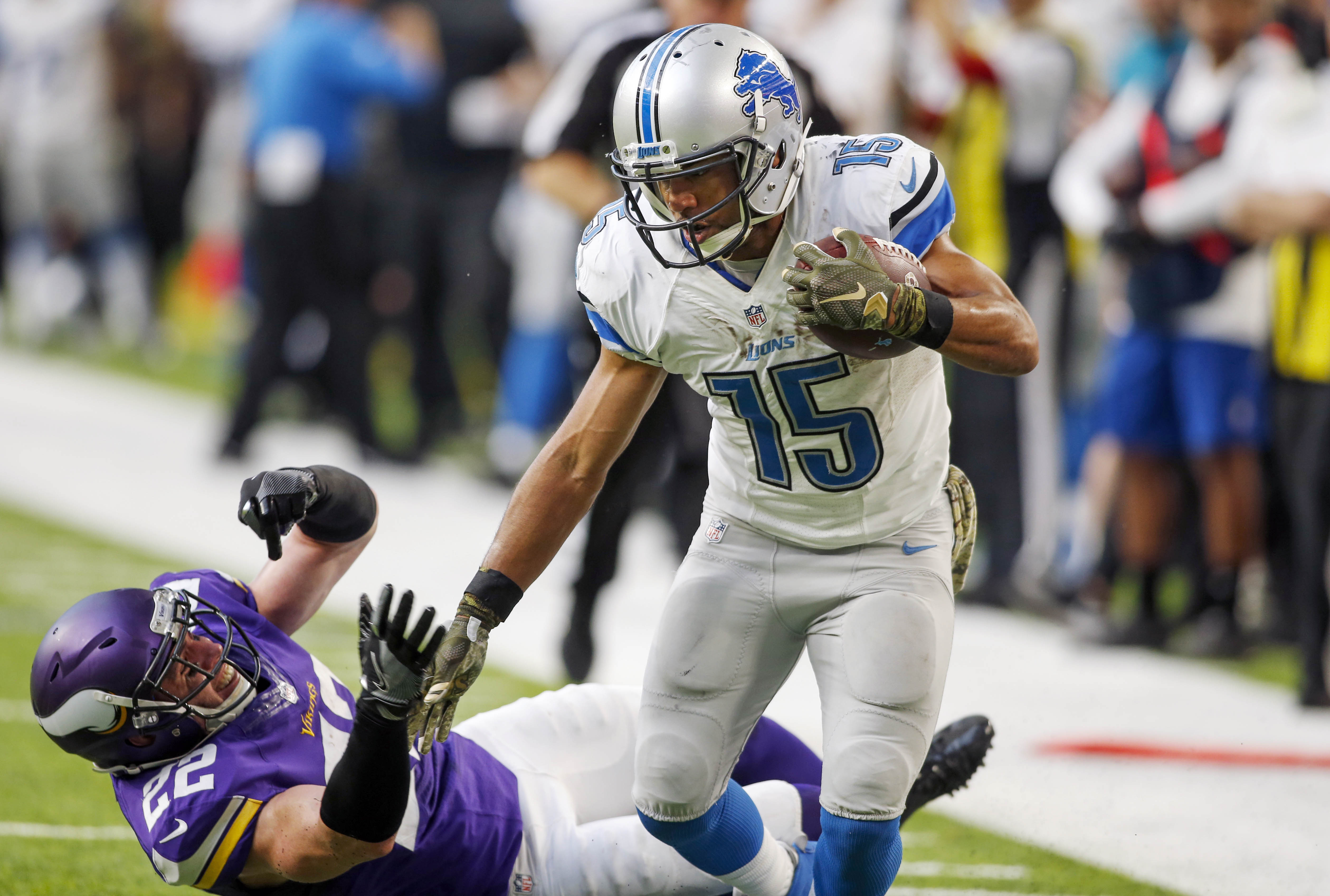 Tate's TD in OT lifts Lions over Vikings, 22-16