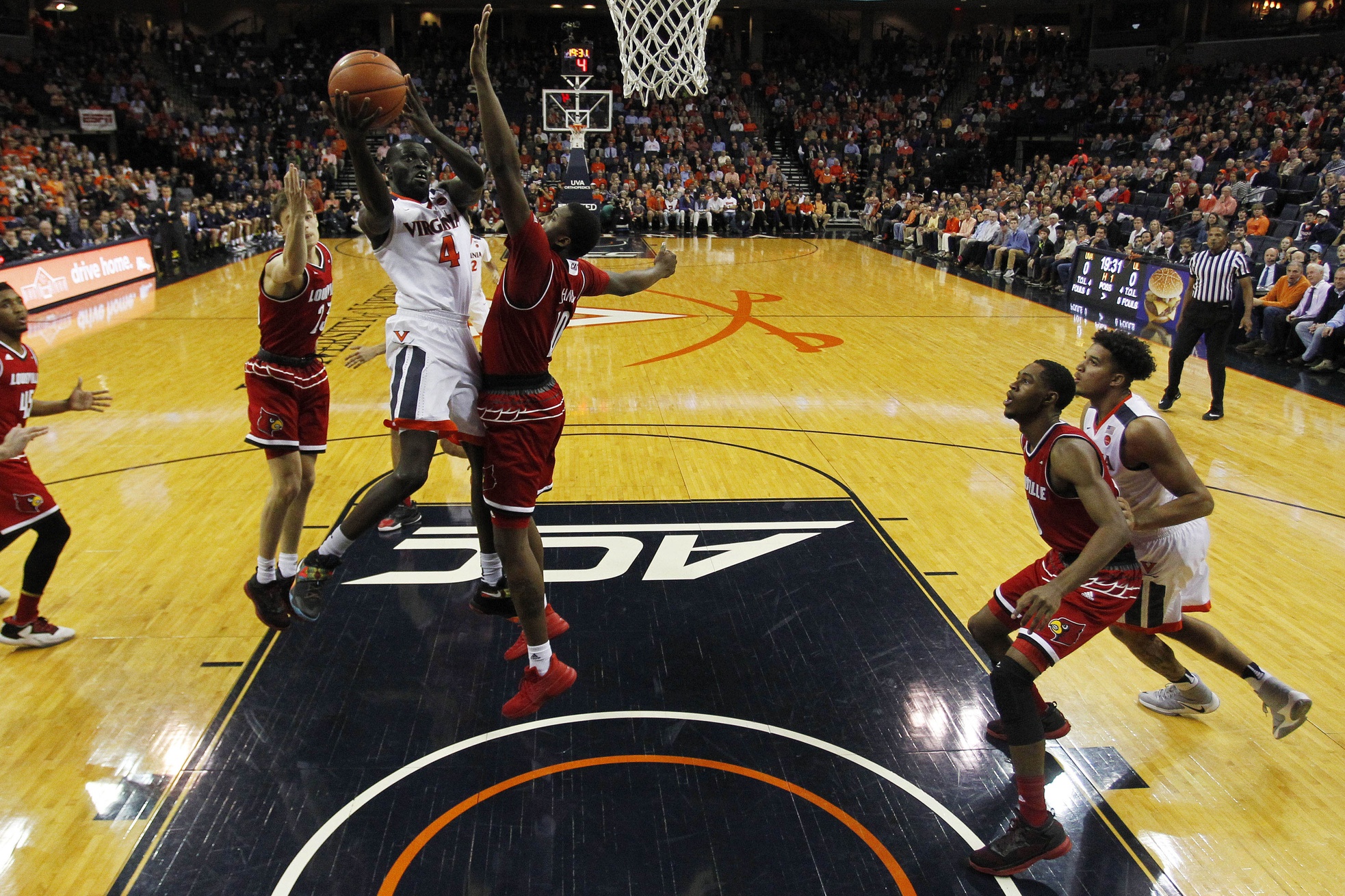 Louisville basketball court bringing back Dunking Cardinal